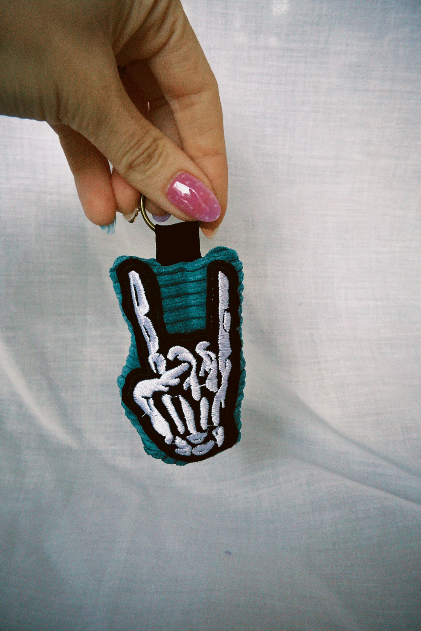 Skeletal Rock Hands Scrappy Keyring